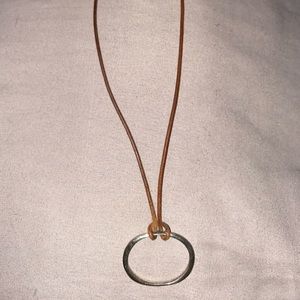Leather necklace with silver decal